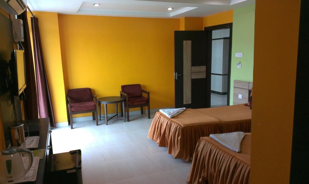 Hotel Sunview Dispur Szoba fotó